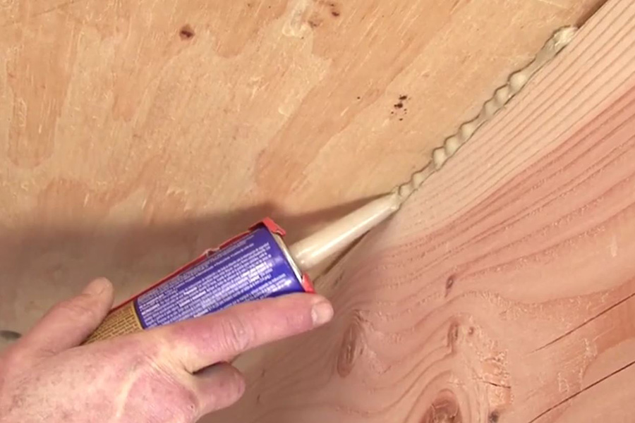 How To Fix Squeaky Wood Floor: Use Construction Adhesive To Fill Long Gaps