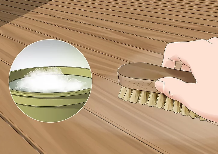 Clean The Wooden Surface With Brush And Soap Water
